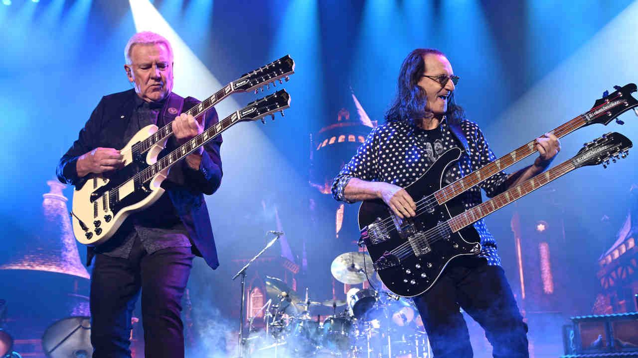 Rush&rsquo;s Alex Lifeson and Geddy Lee performing onstage in LA on June 7
